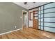 Bedroom featuring hardwood floors, built in closet, and neutral wall paint at 625 Kennesaw Ave, Atlanta, GA 30308