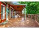 Spacious wooden deck with a covered area, perfect for outdoor entertaining and relaxation at 625 Kennesaw Ave, Atlanta, GA 30308