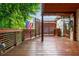 Inviting wooden deck with overhead covering, perfect for outdoor relaxation and entertaining at 625 Kennesaw Ave, Atlanta, GA 30308
