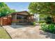 Charming home showcasing a covered front porch and landscaped surroundings at 625 Kennesaw Ave, Atlanta, GA 30308