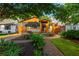 Delightful home boasts a cozy porch, beautiful landscaping, and a brick walkway, enhancing its curb appeal at 625 Kennesaw Ave, Atlanta, GA 30308