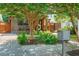 Home featuring a covered front porch, wood accents, horizontal fence, and a lush front yard at 625 Kennesaw Ave, Atlanta, GA 30308
