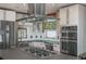 Modern kitchen with stainless steel appliances, stylish cabinetry, and a functional island cooktop at 625 Kennesaw Ave, Atlanta, GA 30308