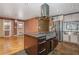 Bright kitchen showcasing stainless steel appliances and a central island for cooking and entertaining at 625 Kennesaw Ave, Atlanta, GA 30308