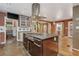 Open kitchen featuring modern appliances and a seamless transition to the living area with hardwood floors at 625 Kennesaw Ave, Atlanta, GA 30308