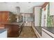 Spacious kitchen featuring a large island, stainless steel appliances, and stylish cabinetry at 625 Kennesaw Ave, Atlanta, GA 30308