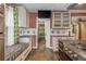 Charming kitchen with ample cabinet space and a cozy breakfast nook area at 625 Kennesaw Ave, Atlanta, GA 30308