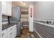 Functional laundry room equipped with modern washer and dryer, ample storage, and stylish tile accents at 625 Kennesaw Ave, Atlanta, GA 30308