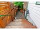 Exterior stairs leading down from the deck, complemented by a wooden privacy fence at 625 Kennesaw Ave, Atlanta, GA 30308