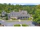 Beautiful community clubhouse, offering a social gathering area with a large lawn and mountain views at 6250 Vista Crossing Way, Cumming, GA 30028
