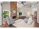 Elegant living room with cozy seating and stone fireplace at 6250 Vista Crossing Way, Cumming, GA 30028