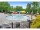 Community splash pad with colorful mushroom fountains and lounge chairs at 6250 Vista Crossing Way, Cumming, GA 30028