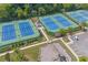 Aerial view of community tennis courts and playground at 6250 Vista Crossing Way, Cumming, GA 30028
