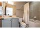 Neutral bathroom with grey vanity and tub/shower combo at 791 Wylie Se St # 912, Atlanta, GA 30316
