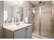 Modern bathroom featuring sleek vanity, ample lighting, and a glass-enclosed shower at 791 Wylie Se St # 912, Atlanta, GA 30316