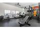 Well-equipped community gym with cardio machines, free weights, and ample workout space at 791 Wylie Se St # 912, Atlanta, GA 30316