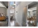 Bright, airy hallway featuring a view into a dining area, a mirror, and modern decor at 791 Wylie Se St # 912, Atlanta, GA 30316