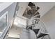 Modern staircase with metal railing, adding architectural flair to the living space at 791 Wylie Se St # 912, Atlanta, GA 30316