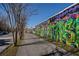 Vibrant street art mural adds a splash of color to the neighborhood sidewalk at 791 Wylie Se St # 912, Atlanta, GA 30316