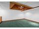 Finished basement with decorative ceiling features and neutral-colored walls at 1498 Camp Point Ne Ct, Roswell, GA 30075