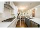 Spacious kitchen seamlessly flowing into the dining and living areas, featuring modern appliances at 2080 Abbey Rd, Roswell, GA 30076