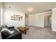 Spacious living room featuring a shiplap accent wall and neutral carpeting at 2080 Abbey Rd, Roswell, GA 30076
