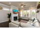 Cozy living room features a fireplace, hardwood floors, and plenty of natural light at 2080 Abbey Rd, Roswell, GA 30076