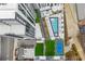 Overhead aerial shot of community pool, tennis court, and common area atop a luxury high rise in an urban community at 2425 Peachtree Rd # 508, Atlanta, GA 30305