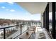 This beautiful balcony has a sitting area with a view of the pool and the city skyline at 2425 Peachtree Rd # 508, Atlanta, GA 30305