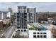 Apartment building with recreational amenities including a pool and tennis court for residents at 2425 Peachtree Rd # 508, Atlanta, GA 30305
