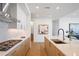 Modern kitchen featuring stainless steel appliances, custom cabinetry, and a large island at 2425 Peachtree Rd # 508, Atlanta, GA 30305