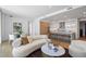 Open-concept living space with kitchen, dining, and living areas featuring hardwood floors at 2425 Peachtree Rd # 508, Atlanta, GA 30305