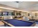 Well-appointed lounge area with a pool table and media screens at 2425 Peachtree Rd # 508, Atlanta, GA 30305