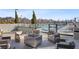 Outdoor pool area featuring modern lounge furniture, a fire pit, and city views at 2425 Peachtree Rd # 508, Atlanta, GA 30305
