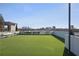 Spacious rooftop deck with artificial turf, benches, and stunning city views at 2425 Peachtree Rd # 508, Atlanta, GA 30305