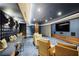 Entertainment room with theater-style seating and large screen at 2425 Peachtree Rd # 508, Atlanta, GA 30305