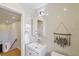 Bright bathroom with stylish sink, mirror, and tile, complemented by trendy decor and modern fixtures at 4060 Haverhill Ne Dr # F, Atlanta, GA 30342