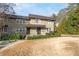Charming townhome featuring a neat front yard and well-maintained landscaping at 4060 Haverhill Ne Dr # F, Atlanta, GA 30342