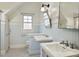 Charming bathroom with dual pedestal sinks and checkered tile flooring at 509 Ponce De Leon Pl, Decatur, GA 30030