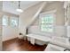 Bright bathroom with a clawfoot tub, wainscoting, and double sinks at 509 Ponce De Leon Pl, Decatur, GA 30030