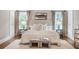 An inviting bedroom features large windows, an upholstered headboard and plush linens and decor at 509 Ponce De Leon Pl, Decatur, GA 30030