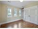 Bedroom with hardwood floors, natural light and large built-in closet at 509 Ponce De Leon Pl, Decatur, GA 30030