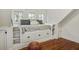 A close-up view of a bedroom with built-in features, including a daybed and storage at 509 Ponce De Leon Pl, Decatur, GA 30030