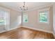 Serene bedroom with hardwood floors and large windows providing ample natural light at 509 Ponce De Leon Pl, Decatur, GA 30030