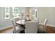 Bright dining room with hardwood floors and a round table at 509 Ponce De Leon Pl, Decatur, GA 30030