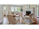 Cozy living room featuring a fireplace, hardwood floors, and stylish furniture at 509 Ponce De Leon Pl, Decatur, GA 30030