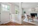 Bright living room with hardwood floors, a fireplace, and plenty of natural light at 509 Ponce De Leon Pl, Decatur, GA 30030