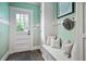 Charming mud room with slate floors, beadboard walls, and built-in bench seating at 509 Ponce De Leon Pl, Decatur, GA 30030