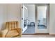 Cozy seating area on a private balcony with tiled floor and bright natural light at 520 Wabash Ne Ave, Atlanta, GA 30312