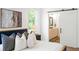 Bright bedroom with stylish decor, a sliding closet door and an ensuite bathroom at 520 Wabash Ne Ave, Atlanta, GA 30312